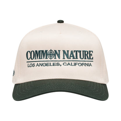 Classic Target Hat in natural and black, front view with Common Nature Los Angeles embroidery