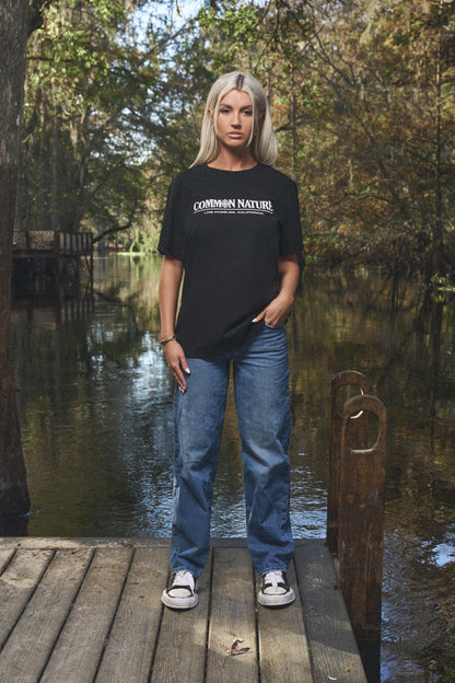 Woman wearing the Western Frontier Tee in black, front view