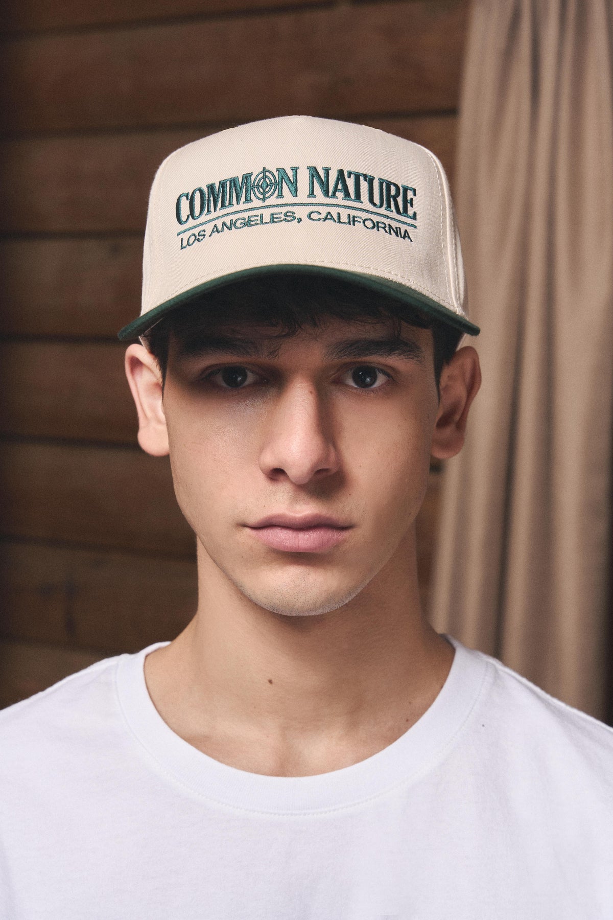 Man wearing the Classic Target Hat in natural and black