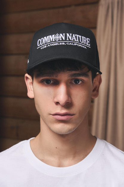 Man wearing the Classic Target Hat in black